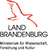 Logo mit stilisiertem Vogel in Rot, darunter der Text: Land Brandenburg. Ministerium für Wissenschaft, Forschung und Kultur